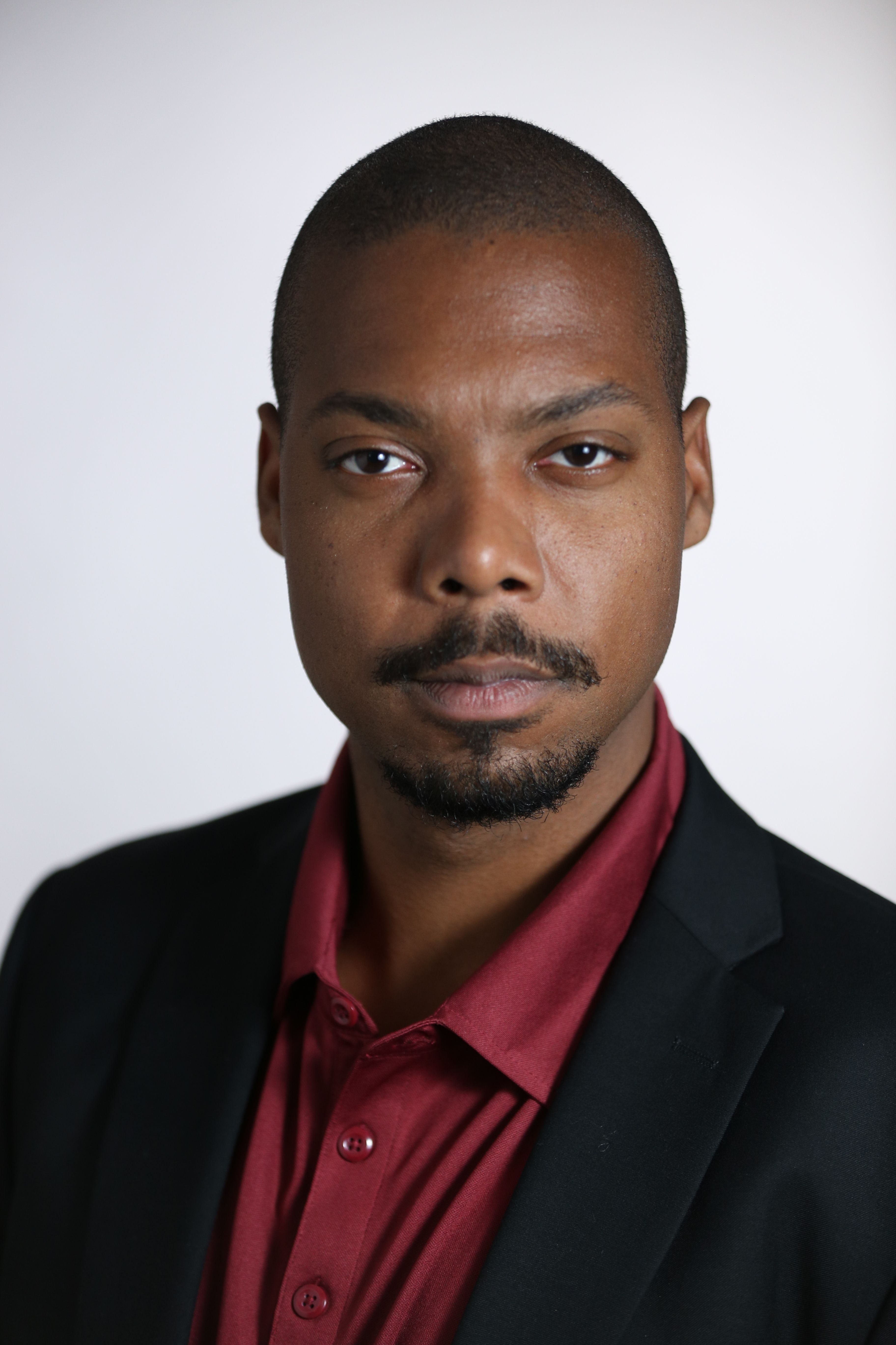 Illustrative profile portrait for Chief Michael Adebayo